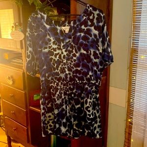 It’s an blue black white animal print blouse with draw string Mid section